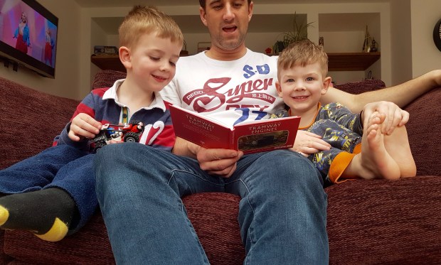 Daddy reading Thomas